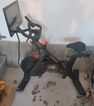 Peloton Indoor Cycling Bike, Touchscreen, Adjustable Seat, Bottle Holder, Black. Fixed Price $355.00.