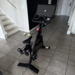 Peloton Bike Upright Exercise Black Touchscreen Display Dumbbell Holder. Fixed Price $400.00.