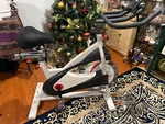 Sunny Health & Fitness Flywheel Indoor Cycle Bike W/ Clipped Pedals SF-B1509. Fixed Price $150.00.