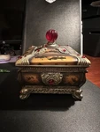 Gold Ornate Resin Box With Red Jewel Stone Inlay And Top Knob. Fixed Price $34.95.