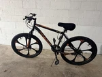 Mongoose Mountain Bike 26 Black/orange. Fixed Price $100.00.
